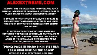 Proxy Paige in micro bikini fist her butt & prolapse on the beach