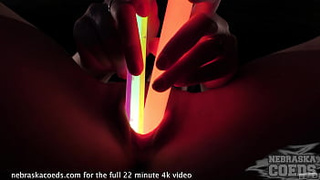 attractive teenie gets naked and opens up her twat with glowsticks dirty object insertions