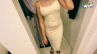Talking, shopping, picking out a dress for a Russian sweetie.