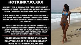 Hotkinkyjo deep dildo fuck and belly bulge at the public beach