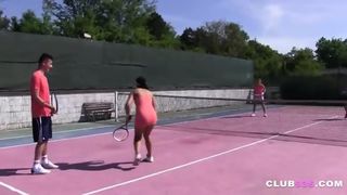 Two teens banged on a tennis court