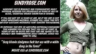 Charming blonde Sindy Rose fuck her rear-end with a white rod in the forest