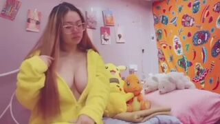 Giant Titty Japanese Youngster Crying while Brushing her Hair in a Pikachu Onesie
